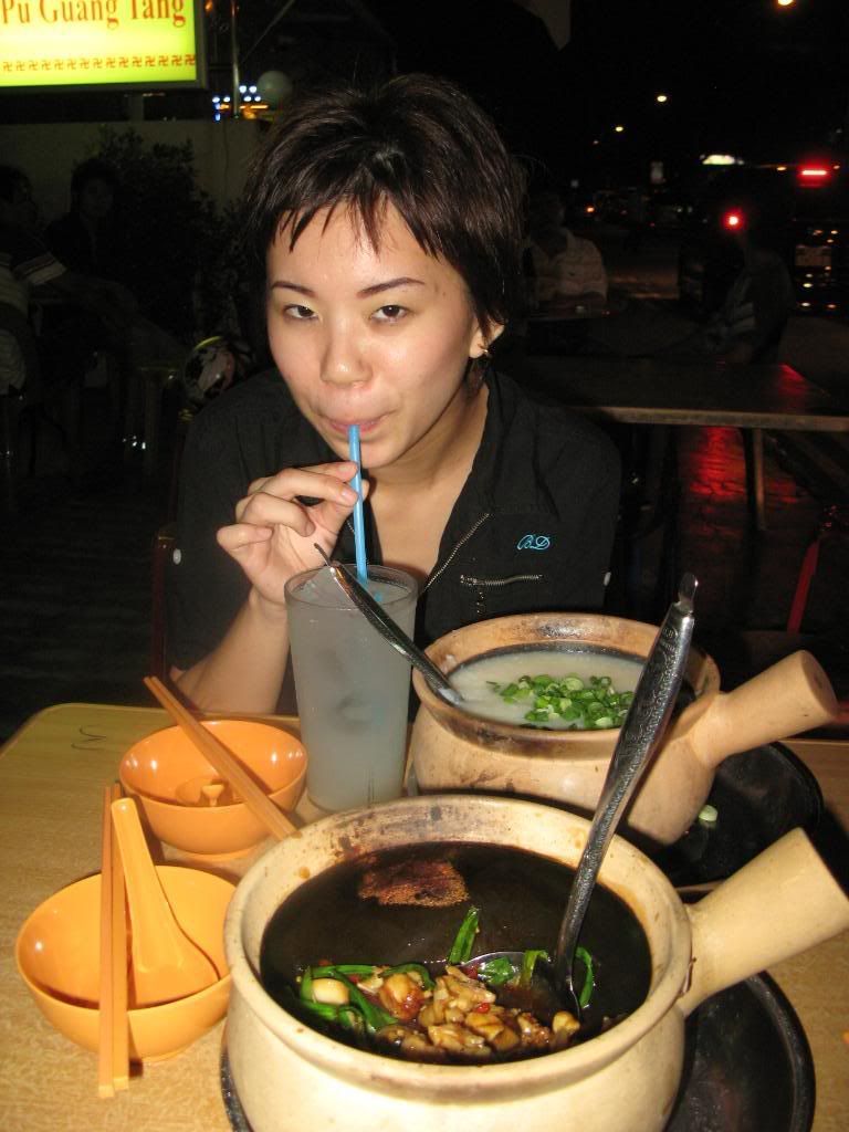 Mei & Frogs Me trying to act cute alongside a pot of congee and frog legs.