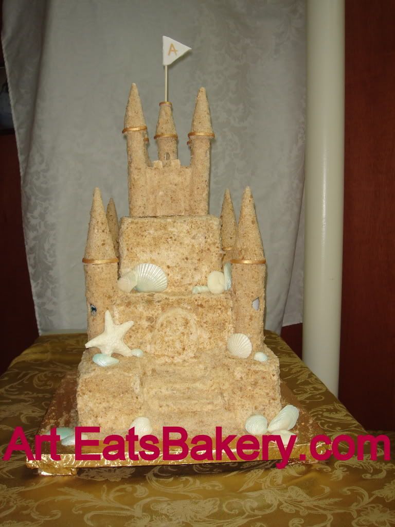 Sandcastle wedding cake with white chocolate seashells Pictures, Images and Photos