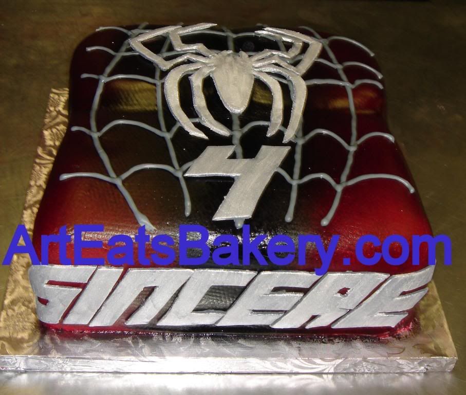 Spiderman birthday cake with silver sugar spider and web