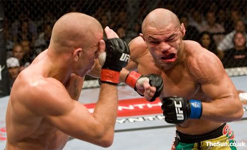 gsp_alves_punch_ufc100.jpg