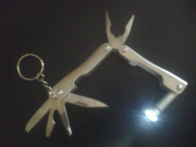 dụng cụ đa năng xếp gọn(dao,búa,tu vít,kềm,kéo.v.v...)cho ae đi du lịch nè! - 5