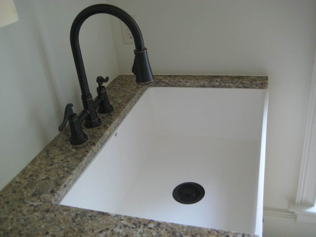 fireclay vs. quartz farmhouse sink